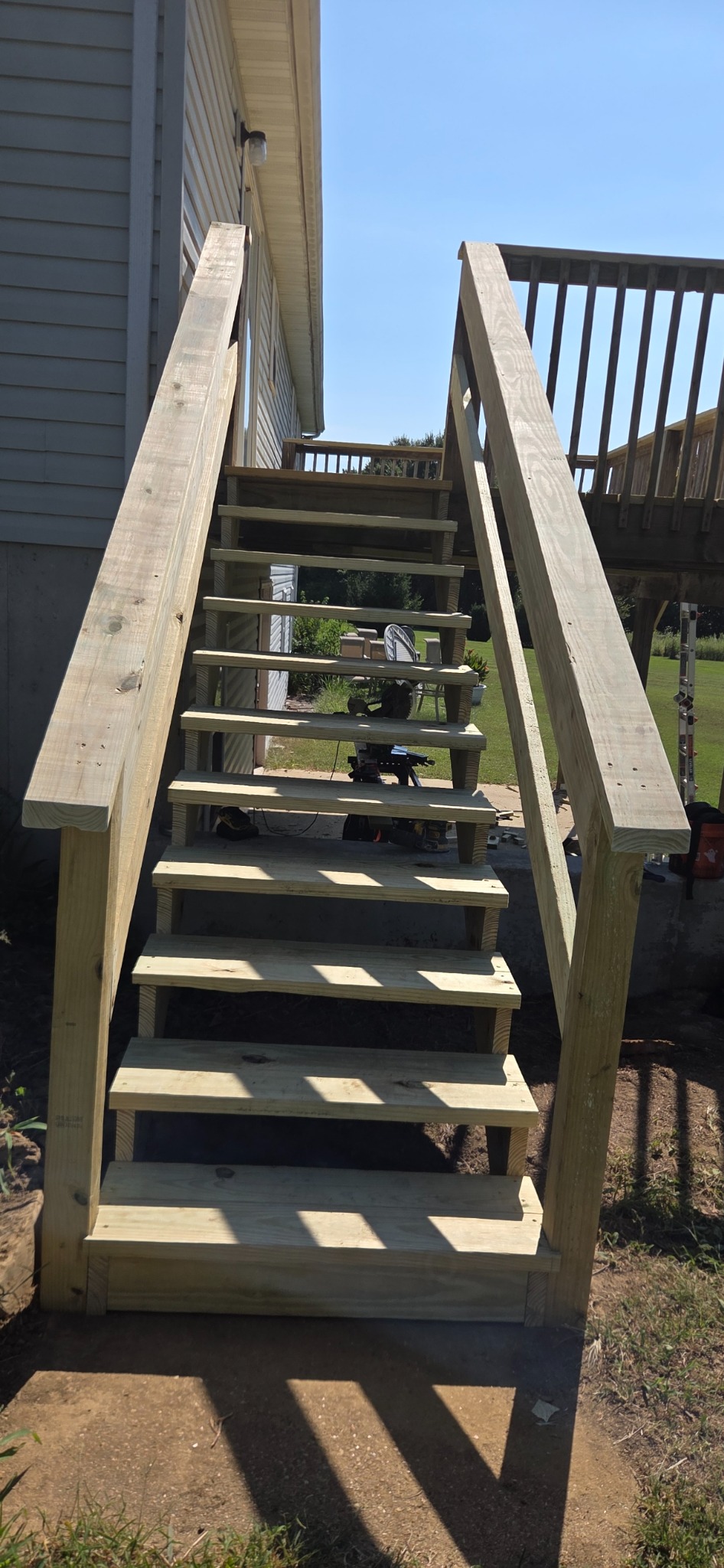 View up the rebuilt wooden stairs with new treads and side rails